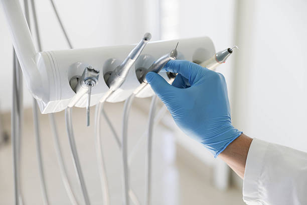 Professional Tooth Extraction technician working in Slaton, TX